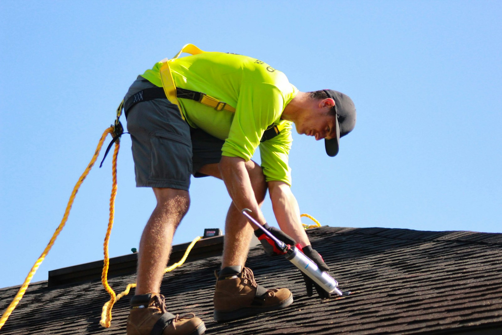 A roofing crew at work on a rooftop